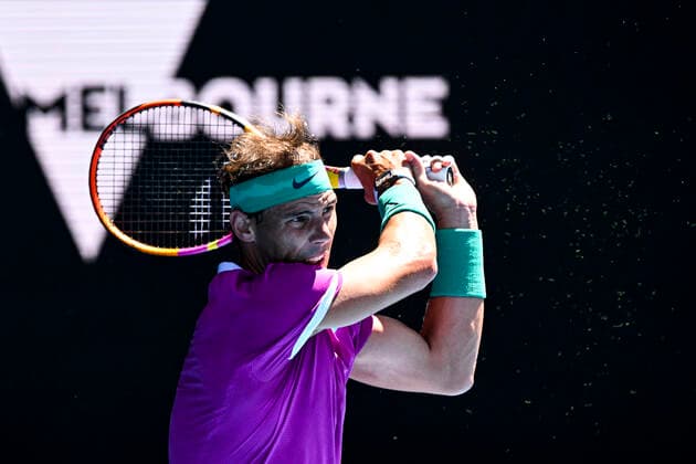 TENNIS AUSTRALIAN OPEN, Rafael Nadal of Spain plays a shot during his first Round Men s singles match against Marcos Giron of the United States on Day 1 of the Australian Open, at Melbourne Park, in Melbourne, Monday, January 17, 2022. ( NO ARCHIVING, EDITORIAL USE ONLY, NO USE IN BOOKS WITHOUT CONSENT MELBOURNE VIC AUSTRALIA  Copyright: xDAVExHUNTx 20220117001614132824