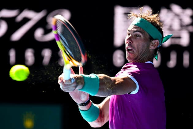 TENNIS AUSTRALIAN OPEN, Rafael Nadal of Spain plays a shot during his first Round Men s singles match against Marcos Giron of the United States on Day 1 of the Australian Open, at Melbourne Park, in Melbourne, Monday, January 17, 2022. ( NO ARCHIVING, EDITORIAL USE ONLY, NO USE IN BOOKS WITHOUT CONSENT MELBOURNE VIC AUSTRALIA  Copyright: xDAVExHUNTx 20220117001614147265