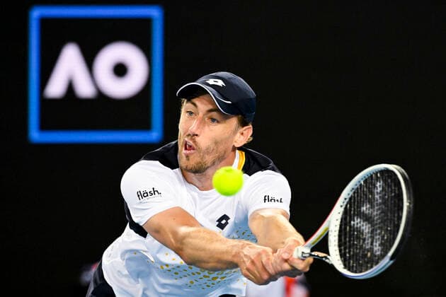 TENNIS AUSTRALIAN OPEN, John Millman of Australia plays a shot during his first Round Men s singles match against Feliciano Lopez of Spain on Day 1 of the Australian Open, at Melbourne Park, in Melbourne, Monday, January 17, 2022. ( NO ARCHIVING, EDITORIAL USE ONLY, NO USE IN BOOKS WITHOUT CONSENT MELBOURNE VIC AUSTRALIA  Copyright: xDEANxLEWINSx 20220117001614177635