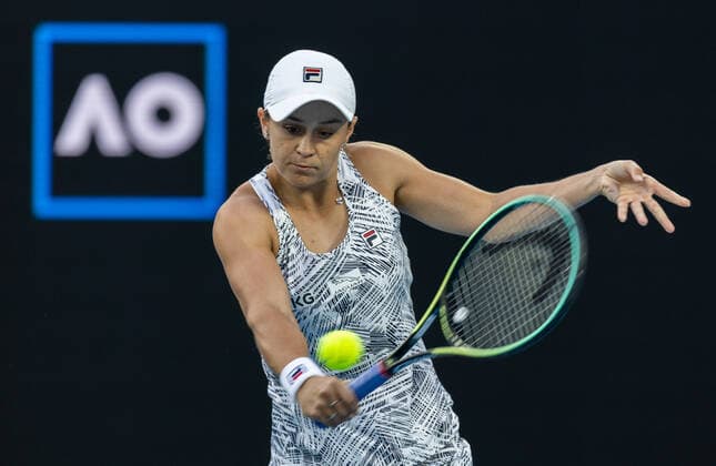 (220117) -- MELBOURNE, Jan. 17, 2022 -- Ashleigh Barty of Australia competes during the women s singles first round match against Lesia Tsurenko of Ukraine at Australian Open 2022 in Melbourne, Australia, Jan. 17, 2022. (Photo by Xinhua) (SP)AUSTRALIA-MELBOURNE-TENNIS-AUSTRALIAN OPEN-WOMEN S SINGLES HuxJingchen 