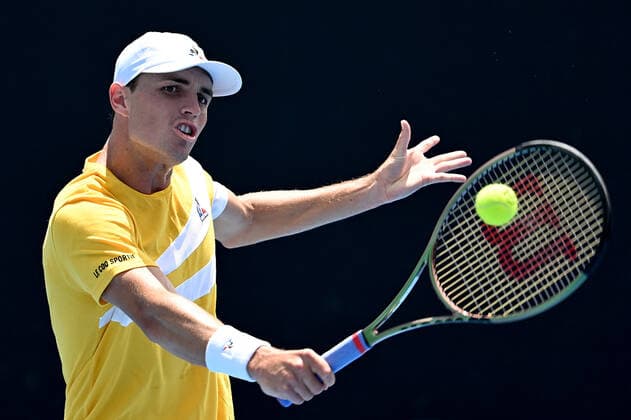 TENNIS AUSTRALIAN OPEN, Christopher O?Connell of Australia plays a shot during the first round Men?s singles match against Hugo Gaston of France on Day 2 of the Australian Open, at Melbourne Park, in Melbourne, Tuesday, January 18, 2022. ( NO ARCHIVING, EDITORIAL USE ONLY, NO USE IN BOOKS WITHOUT CONSENT MELBOURNE VIC AUSTRALIA  Copyright: xDAVExHUNTx 20220118001614363071