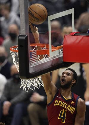 Cleveland Cavaliers Evan Mobley (4) lays the ball in for two against the Brooklyn Nets at Rocket Mortgage Field House in Cleveland, Ohio on Monday, January 17, 2022.  CLE20220117120 AARONxJOSEFCZYK