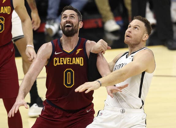 Cleveland Cavaliers Kevin Love (0) battles Brooklyn Nets Blake Griffin (2) for postion at Rocket Mortgage Field House in Cleveland, Ohio on Monday, January 17, 2022.  CLE20220117113 AARONxJOSEFCZYK