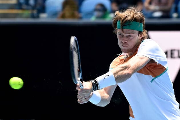 TENNIS AUSTRALIAN OPEN, Andrey Rublev of Russia returns during his first round Men?s singles match against Gianluca Mager of Italy on Day 2 of the Australian Open, at Melbourne Park, in Melbourne, Tuesday, January 18, 2022. ( NO ARCHIVING, EDITORIAL USE ONLY, NO USE IN BOOKS WITHOUT CONSENT MELBOURNE VIC AUSTRALIA  Copyright: xJOELxCARRETTx 20220118001614372386