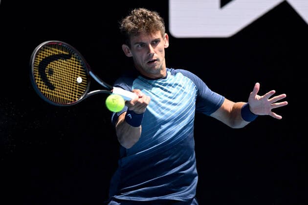 TENNIS AUSTRALIAN OPEN, Henri Laaksonen of Switzerland returns during his first round Men?s singles match against Daniil Medvedev of Russia on Day 2 of the Australian Open, at Melbourne Park, in Melbourne, Tuesday, January 18, 2022. ( NO ARCHIVING, EDITORIAL USE ONLY, NO USE IN BOOKS WITHOUT CONSENT MELBOURNE VIC AUSTRALIA  Copyright: xDEANxLEWINSx 20220118001614373024