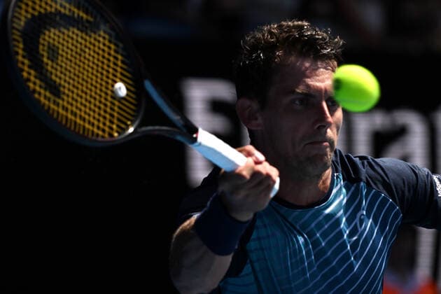 TENNIS AUSTRALIAN OPEN, Henri Laaksonen of Switzerland plays a shot during the first round Men?s singles match against Daniil Medvedev of Russia on Day 2 of the Australian Open, at Melbourne Park, in Melbourne, Tuesday, January 18, 2022. ( NO ARCHIVING, EDITORIAL USE ONLY, NO USE IN BOOKS WITHOUT CONSENT MELBOURNE VIC AUSTRALIA  Copyright: xDEANxLEWINSx 20220118001614383011