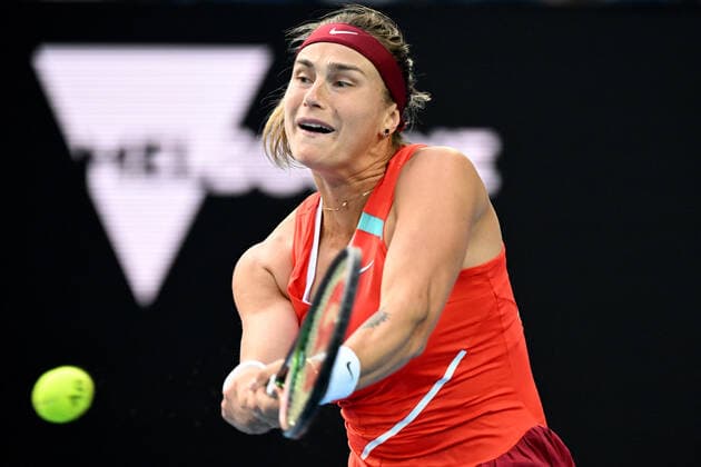 TENNIS AUSTRALIAN OPEN, Aryna Sabelenka of Belarus plays a shot during her first round Women?s singles match against Storm Sanders of Australia on Day 2 of the Australian Open, at Melbourne Park, in Melbourne, Tuesday, January 18, 2022. ( NO ARCHIVING, EDITORIAL USE ONLY, NO USE IN BOOKS WITHOUT CONSENT MELBOURNE VIC AUSTRALIA  Copyright: xDEANxLEWINSx 20220118001614408951