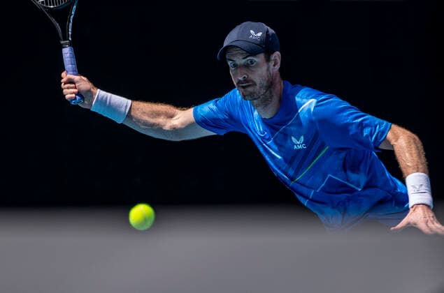 (220118) -- MELBOURNE, Jan. 18, 2022 -- Andy Murray of Britain hits a return during the Men s Singles first round match against Andy Murray of Britain at Australian Open in Melbourne Park, in Melbourne, Australia, on Jan. 18, 2022. ) (SP)AUSTRALIA-MELBOURNE-TENNIS-AUSTRALIAN OPEN-MEN S SINGLES BaixXuefei 