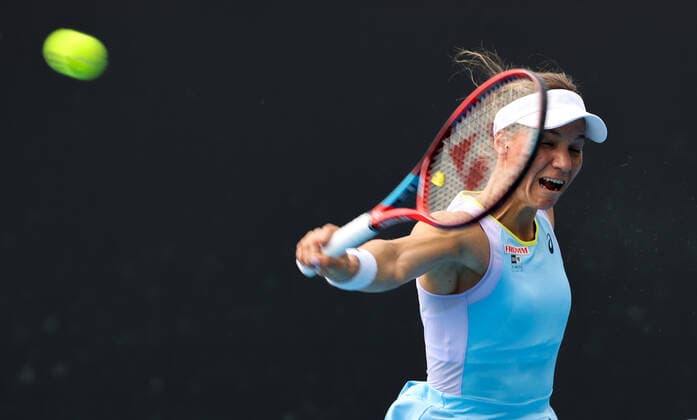 (220118) -- MELBOURNE, Jan. 18, 2022 -- Viktorija Golubic of Switzerland hits a return during the Women s Singles first round match against Zhang Shuai of China at Australian Open in Melbourne Park, in Melbourne, Australia, on Jan. 18, 2022. ) (SP)AUSTRALIA-MELBOURNE-TENNIS-AUSTRALIAN OPEN-WOMEN S SINGLES BaixXuefei 
