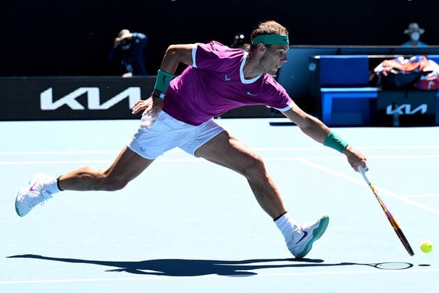 TENNIS AUSTRALIAN OPEN, Rafael Nadal of Spain plays a shot during his second round Men?s singles match against Yannick Hanfmann of Germany on Day 3 of the Australian Open, at Melbourne Park, in Melbourne, Wednesday, January 19, 2022. ( NO ARCHIVING, EDITORIAL USE ONLY, NO USE IN BOOKS WITHOUT CONSENT MELBOURNE VIC AUSTRALIA  Copyright: xDEANxLEWINSx 20220119001614640532