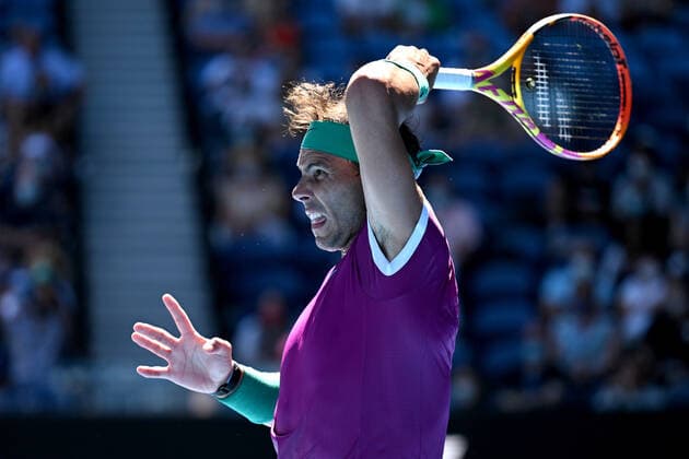 TENNIS AUSTRALIAN OPEN, Rafael Nadal of Spain plays a shot during his second round Men?s singles match against Yannick Hanfmann of Germany on Day 3 of the Australian Open, at Melbourne Park, in Melbourne, Wednesday, January 19, 2022. ( NO ARCHIVING, EDITORIAL USE ONLY, NO USE IN BOOKS WITHOUT CONSENT MELBOURNE VIC AUSTRALIA  Copyright: xDEANxLEWINSx 20220119001614641189