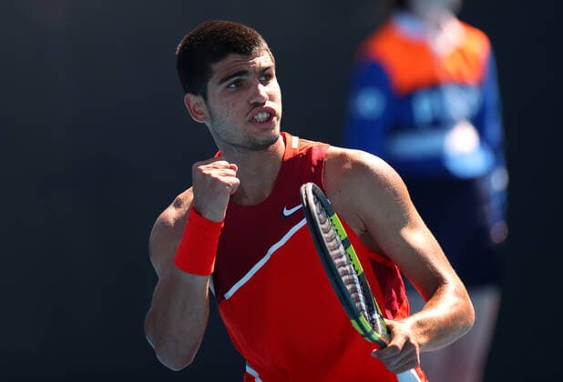Mandatory Credit: Photo by Ella Ling Shutterstock (12763715dd) Carlos Alcaraz Garfia during his second round match Australian Open, Day Three, Tennis, Melbourne Park, Melbourne, Australia - 19 Jan 2022 Australian Open, Day Three, Tennis, Melbourne Park, Melbourne, Australia - 19 Jan 2022 Copyright: xEllaxLing Shutterstockx 12763715dd