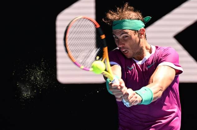 Mandatory Credit: Photo by James Gourley Shutterstock (12763717cu) Rafael Nadal during his second round match Australian Open, Day Three, Tennis, Melbourne Park, Melbourne, Australia - 19 Jan 2022 Australian Open, Day Three, Tennis, Melbourne Park, Melbourne, Australia - 19 Jan 2022 Copyright: xJamesxGourley Shutterstockx 12763717cu