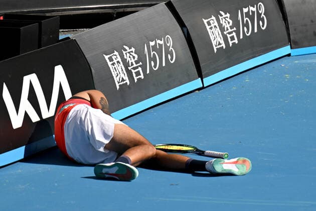 TENNIS AUSTRALIAN OPEN, Nick Kyrgios of Australia falls during his first round Men?s doubles match with Thanasi Kokkinakis against Alex Bolt and James McCabe of Australia on Day 3 of the Australian Open, at Melbourne Park, in Melbourne, Wednesday, January 19, 2022. ( NO ARCHIVING, EDITORIAL USE ONLY, NO USE IN BOOKS WITHOUT CONSENT MELBOURNE VIC AUSTRALIA  Copyright: xDEANxLEWINSx 20220119001614660406