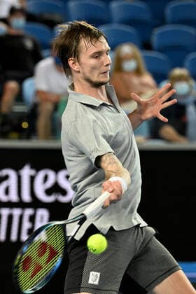 TENNIS AUSTRALIAN OPEN, Alexander Bublik of Khazakstan plays a shot during his second round Men?s singles match against Gael Monfils of France on Day 3 of the Australian Open, at Melbourne Park, in Melbourne, Wednesday, January 19, 2022. ( NO ARCHIVING, EDITORIAL USE ONLY, NO USE IN BOOKS WITHOUT CONSENT MELBOURNE VIC AUSTRALIA  Copyright: xDEANxLEWINSx 20220119001614716047