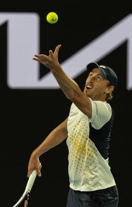 (220119) -- MELBOURNE, Jan. 19, 2022 -- John Millman of Australia serves during the Men s Singles second round match against Alexander Zverev of Germany at Australian Open in Melbourne Park, in Melbourne, Australia, on Jan. 19, 2022. (Photo by Hu Jingchen Xinhua) (SP)AUSTRALIA-MELBOURNE-TENNIS-AUSTRALIAN OPEN-MEN S SINGLES BaixXuefei 