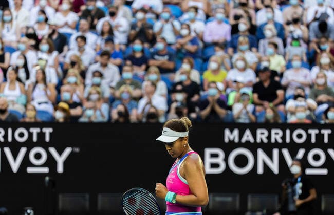 (220119) -- MELBOURNE, Jan. 19, 2022 -- Osaka Naomi of Japan reacts during the Women s single match against Madison Brengle of the United States at Australian Open in Melbourne Park, in Melbourne, Australia, Jan. 19, 2022. (Photo by Xinhua) (SP)AUSTRALIA-MELBOURNE-TENNIS-AUSTRALIAN OPEN-WOMEN S SINGLES HuxJingchen 
