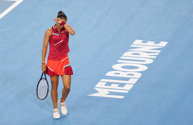 (220119) -- MELBOURNE, Jan. 19, 2022 -- Zheng Qinwen of China reacts during the Women s Single second round match against Maria Sakkari of Greece at Australian Open 2022 in Melbourne, Australia, on Jan. 19, 2022. ) (SP)AUSTRALIA-MELBOURNE-TENNIS-AUSTRALIAN OPEN-WOMEN S SINGLES BaixXuefei 
