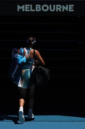 (220120) -- MELBOURNE, Jan. 20, 2022 -- Garbine Muguruza of Spain leaves the court after the Women s Singles second round match against Alize Cornet of France at Australian Open in Melbourne Park, in Melbourne, Australia, on Jan. 20, 2022. ) (SP)AUSTRALIA-MELBOURNE-TENNIS-AUSTRALIAN OPEN-WOMEN S SINGLES-SECOND ROUND BaixXuefei 