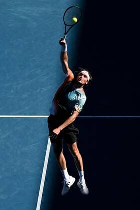 Mandatory Credit: Photo by James Gourley Shutterstock (12765058eu) Stefanos Tsitsipas during his second round match Australian Open, Day Four, Tennis, Melbourne Park, Melbourne, Australia - 20 Jan 2022 Australian Open, Day Four, Tennis, Melbourne Park, Melbourne, Australia - 20 Jan 2022  Copyright: xJamesxGourley Shutterstockx 12765058eu