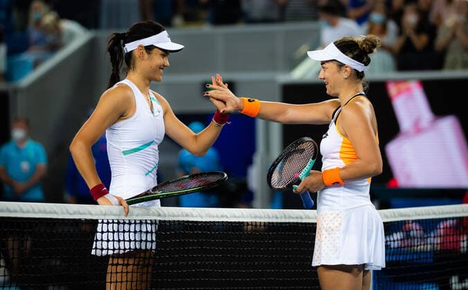 January 20, 2022, MELBOURNE, AUSTRALIA: Emma Raducanu of Great Britain & Danka Kovinic of Montenegro in action during the second round of the 2022 Australian Open Grand Slam Tennis Tournament MELBOURNE AUSTRALIA - ZUMAa181 20220120_zaa_a181_120 Copyright: xRobxPrangex