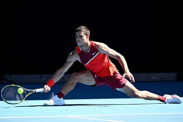 TENNIS AUSTRALIAN OPEN, Carlos Acaraz of Spain during his third round Men?s singles match against Matteo Berrettini of Italy on Day 5 of the Australian Open, at Melbourne Park, in Melbourne, Friday, January 21, 2022. ( NO ARCHIVING, EDITORIAL USE ONLY, NO USE IN BOOKS WITHOUT CONSENT MELBOURNE VIC AUSTRALIA  Copyright: xDAVExHUNTx 20220121001615398946