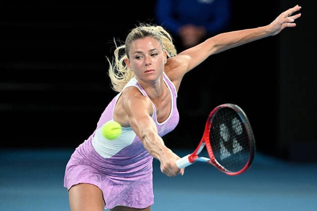 TENNIS AUSTRALIAN OPEN, Camila Giorgi of Italy during her third round Women?s singles match against Ashleigh Barty of Australia on Day 5 of the Australian Open, at Melbourne Park, in Melbourne, Friday, January 21, 2022. ( NO ARCHIVING, EDITORIAL USE ONLY, NO USE IN BOOKS WITHOUT CONSENT MELBOURNE VIC AUSTRALIA  Copyright: xDAVExHUNTx 20220121001615437871