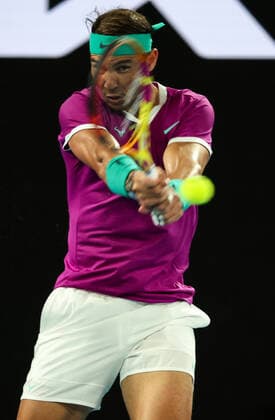 (220121) -- MELBOURNE, Jan. 21, 2022 -- Rafael Nadal of Spain competes during the men s singles 3rd round match against Karen Khachanov of Russia at Australian Open in Melbourne Park, in Melbourne, Australia, Jan. 21, 2022. ) (SP)AUSTRALIA-MELBOURNE-TENNIS-AUSTRALIAN OPEN-MEN S SINGLES-THIRD ROUND BaixXuefei 