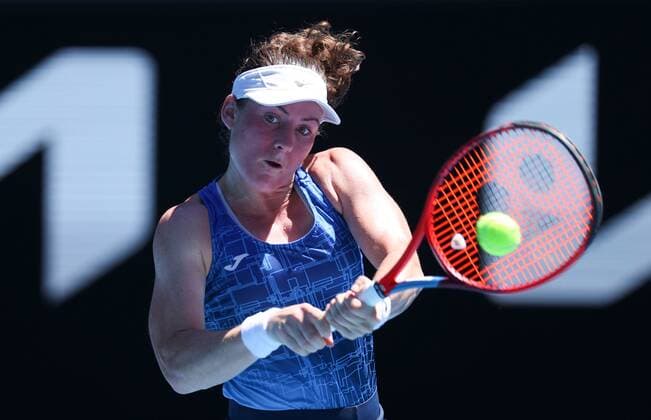 Mandatory Credit: Photo by Ella Ling Shutterstock (12765089l) Tamara Zidansek in third round action Australian Open, Day Six, Tennis, Melbourne Park, Melbourne, Australia - 22 Jan 2022 Australian Open, Day Six, Tennis, Melbourne Park, Melbourne, Australia - 22 Jan 2022  Copyright: xEllaxLing Shutterstockx 12765089l