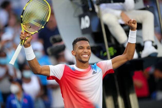 Mandatory Credit: Photo by Ella Ling Shutterstock (12765089da) Felix Auger-Aliassime celebrates victory in his third round match Australian Open, Day Six, Tennis, Melbourne Park, Melbourne, Australia - 22 Jan 2022 Australian Open, Day Six, Tennis, Melbourne Park, Melbourne, Australia - 22 Jan 2022 Copyright: xEllaxLing Shutterstockx 12765089da