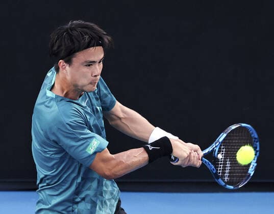 Tennis: Australian Open Japan s Taro Daniel plays in the men s singles third round against Italy s Jannik Sinner at the Australian Open tennis championships in Melbourne on Jan. 22, 2022.  A14AA0001200499P