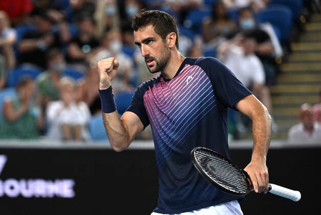 TENNIS AUSTRALIAN OPEN, Marin Cilic of Croatia reacts during his third round match against Andrey Rublev of Russia on Day 6 of the Australian Open, at Melbourne Park, in Melbourne, Saturday, January 22, 2022. ( NO ARCHIVING, EDITORIAL USE ONLY, NO USE IN BOOKS WITHOUT CONSENT MELBOURNE VIC AUSTRALIA  Copyright: xDEANxLEWINSx 20220122001615844374