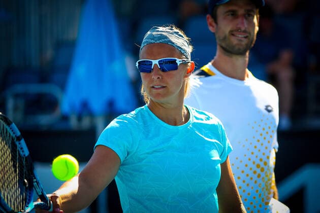 Belgian Kirsten Flipkens and Belgian Sander Gille pictured in action during a tennis match between the Belgian pair Flipkens-Gille and French-Croatian pair Mladenovic-Dodig, in the first round of the mixed doubles at the Australian Open Grand Slam tennis tournament, Saturday 22 January 2022 in Melbourne Park, Melbourne, Australia. The 2022 edition of the Australian Grand Slam takes place from January 17th to January 30th. PATRICKxHAMILTON  x4799916x