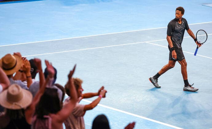 (220123) -- MELBOURNE, Jan. 23, 2022 -- Gael Monfils of France reacts during the men s singles 4th round match against Miomir Kecmanovic of Serbia at Australian Open 2022, in Melbourne, Australia, on Jan. 23, 2022. ) (SP)AUSTRALIA-MELBOURNE-TENNIS-AUSTRALIAN OPEN-MEN S SINGLES-4TH ROUND BaixXuefei 