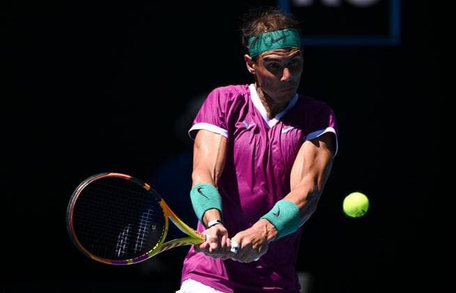 Mandatory Credit: Photo by James Gourley Shutterstock (12773752bi) Rafael Nadal in quarter final action Australian Open, Day Nine, Tennis, Melbourne Park, Melbourne, Australia - 25 Jan 2022 Australian Open, Day Nine, Tennis, Melbourne Park, Melbourne, Australia - 25 Jan 2022 Copyright: xJamesxGourley Shutterstockx 12773752bi
