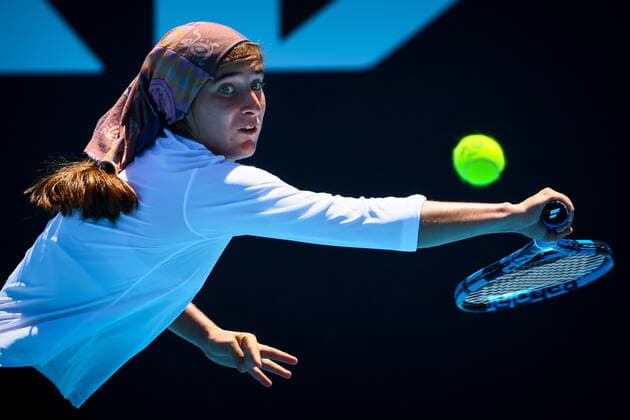 Sport Bilder des Tages Iranian Meshkatolzahra Safi pictured in action during a second round game in the girls singles between Belgian Costoulas and Italian Safi at the Australian Open Grand Slam tennis tournament, Tuesday 25 January 2022 in Melbourne Park, Melbourne, Australia. The 2022 edition of the Australian Grand Slam takes place from January 17th to January 30th. PATRICKxHAMILTON  x5433606x