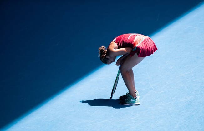 (220125) -- MELBOURNE, Jan. 25, 2022 -- Madison Keys of the United States reacts after the women s singles quarterfinal match against Barbora Krejcikova of the Czech Republic at Australian Open in Melbourne, Australia, Jan. 25, 2022. (Photo by Xinhua) (SP)AUSTRALIA-MELBOURNE-TENNIS-AUSTRALIAN OPEN HuxJingchen 
