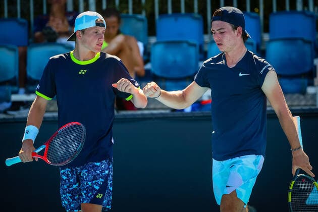 Belgian Alessio Basile and Dutch Daniel Verbeek pictured during a second round game in the boys doubles between Belgian Basile Dutch Verbeek and French Debru Swiss Feldbausch at the Australian Open Grand Slam tennis tournament, Tuesday 25 January 2022 in Melbourne Park, Melbourne, Australia. The 2022 edition of the Australian Grand Slam takes place from January 17th to January 30th. PATRICKxHAMILTON  x5499787x