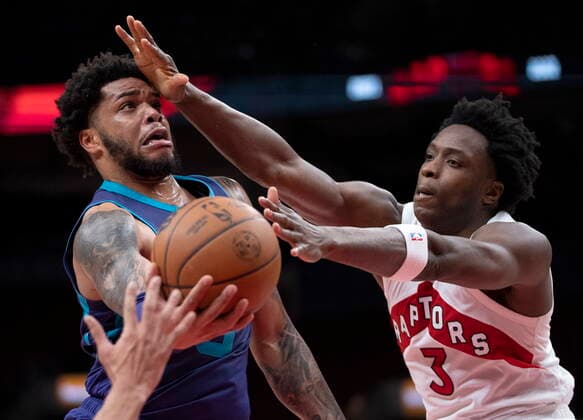 January 25, 2022, Toronto, on, Canada: Charlotte Hornets forward Miles Bridges (0) is stopped by Toronto Raptors forward OG Anunoby (3) during second half NBA, Basketball Herren, USA action in Toronto on Tuesday, January 25, 2022. Canada News - January 25, 2022  - ZUMAc35_ 20220125_zaf_c35_077 Copyright: xFrankxGunnx