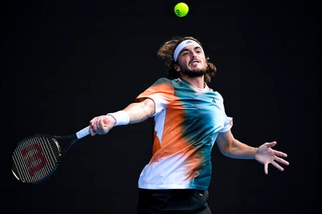TENNIS AUSTRALIAN OPEN, Stefanos Tsitsipas of Greece plays a shot during his Men?s quarterfinal match against Jannik Sinner of Italy on Day 10 of the Australian Open, at Melbourne Park, in Melbourne, Wednesday, January 26, 2022. ( NO ARCHIVING, EDITORIAL USE ONLY, NO USE IN BOOKS WITHOUT CONSENT MELBOURNE VIC AUSTRALIA  Copyright: xDAVExHUNTx 20220126001617228379