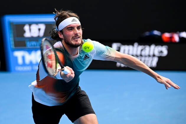 TENNIS AUSTRALIAN OPEN, Stefanos Tsitsipas of Greece plays a shot during his Men?s quarterfinal match against Jannik Sinner of Italy on Day 10 of the Australian Open, at Melbourne Park, in Melbourne, Wednesday, January 26, 2022. ( NO ARCHIVING, EDITORIAL USE ONLY, NO USE IN BOOKS WITHOUT CONSENT MELBOURNE VIC AUSTRALIA  Copyright: xDAVExHUNTx 20220126001617231404