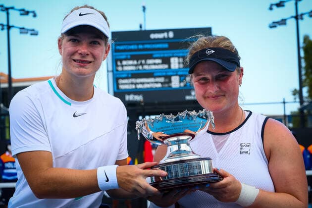 Dutch Diede De Groot (WTA1) and Dutch Aniek Van Koot (WTA3) poses for the photographer after winning the final of the women s wheelchair doubles between Dutch pair De Groot Van Koot and Japanese British pair Kamiji Shuker at the Australian Open Grand Slam tennis tournament, Wednesday 26 January 2022 in Melbourne Park, Melbourne, Australia. The 2022 edition of the Australian Grand Slam takes place from January 17th to January 30th. PATRICKxHAMILTON  x5735510x