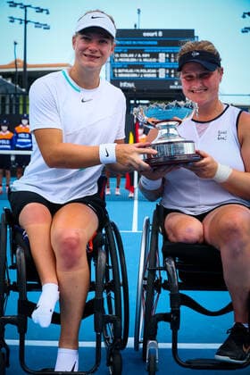 Dutch Diede De Groot (WTA1) and Dutch Aniek Van Koot (WTA3) poses for the photographer after winning the final of the women s wheelchair doubles between Dutch pair De Groot Van Koot and Japanese British pair Kamiji Shuker at the Australian Open Grand Slam tennis tournament, Wednesday 26 January 2022 in Melbourne Park, Melbourne, Australia. The 2022 edition of the Australian Grand Slam takes place from January 17th to January 30th. PATRICKxHAMILTON  x5735529x