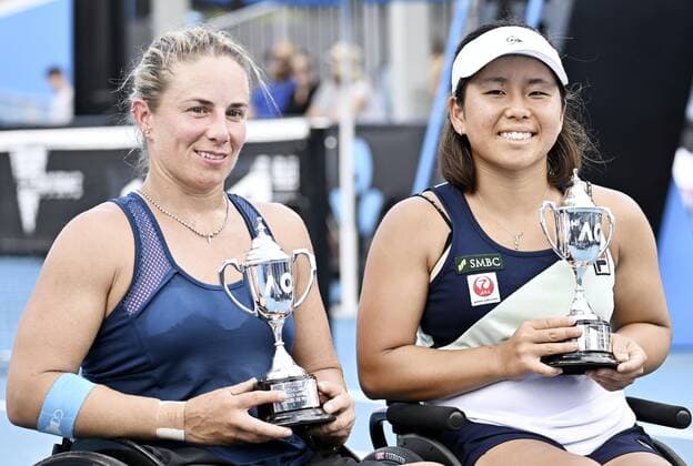 Tennis: Australian Open Lucy Shuker (L) of Britain and Yui Kamiji of Japan pose for photos after taking second place in the women s wheelchair doubles at the Australian Open tennis tournament in Melbourne on Jan. 26, 2022.  A14AA0001206586P