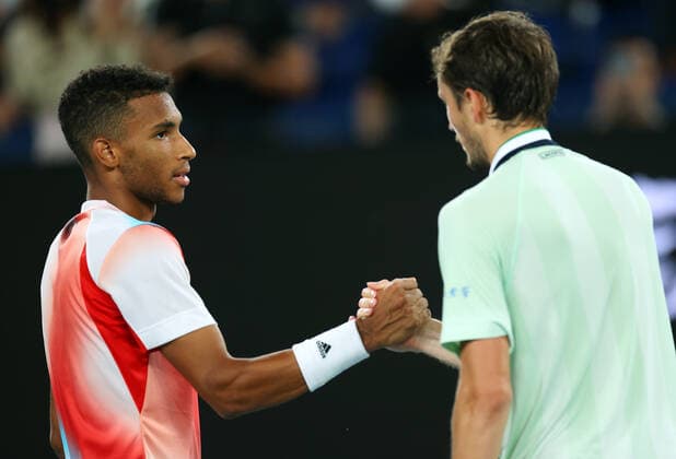 Mandatory Credit: Photo by Ella Ling Shutterstock (12773755fi) Daniil Medvedev celebrates winning his quarter final match against Felix Auger-Aliassime Australian Open, Day Ten, Tennis, Melbourne Park, Melbourne, Australia - 26 Jan 2022 Australian Open, Day Ten, Tennis, Melbourne Park, Melbourne, Australia - 26 Jan 2022 Copyright: xEllaxLing Shutterstockx 12773755fi