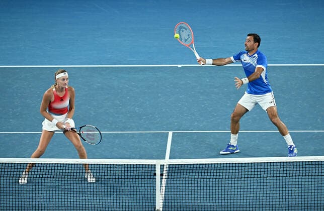 TENNIS AUSTRALIAN OPEN, Ivan Dodig of Croatia (right) and Kristina Mladenovic of France during their Mixed Doubles Final against Jaimee Fourlis and Jason Kubler of Australia on Day 12 of the Australian Open, at Melbourne Park, in Melbourne, Friday, January 28, 2022. ( NO ARCHIVING, EDITORIAL USE ONLY, NO USE IN BOOKS WITHOUT CONSENT MELBOURNE VIC AUSTRALIA  Copyright: xDEANxLEWINSx 20220128001617766840