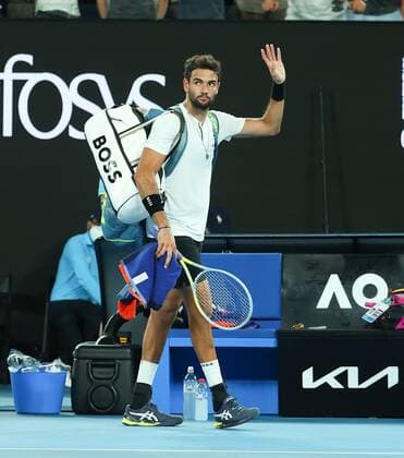 Mandatory Credit: Photo by Ella Ling Shutterstock (12775251y) Matteo Berrettini waves to the crowd after defeat Australian Open, Day Twelve, Tennis, Melbourne Park, Melbourne, Australia - 28 Jan 2022 Australian Open, Day Twelve, Tennis, Melbourne Park, Melbourne, Australia - 28 Jan 2022  Copyright: xEllaxLing Shutterstockx 12775251y
