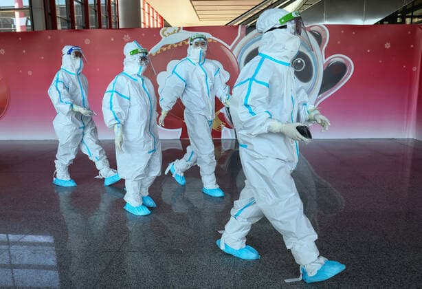 BEIJING, CHINA - JANUARY 28, 2022: Employees are at work at Beijing Capital International Airport ahead of the 2022 Winter Olympics. The 24th Winter Olympic Games, Olympische Spiele, Olympia, OS are scheduled to take place in Beijing on February 4-20, 2022. Valery Sharifulin TASS  0149073410st