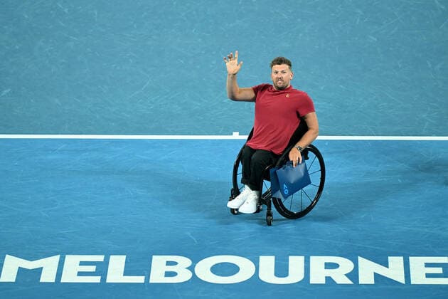 TENNIS AUSTRALIAN OPEN, Australian of the Year Dylan Alcott gestures to the crowd during a presentation for his retirement from competitive tennis, on Day 12 of the Australian Open, at Melbourne Park, in Melbourne, Friday, January 28, 2022. ( NO ARCHIVING, EDITORIAL USE ONLY, NO USE IN BOOKS WITHOUT CONSENT MELBOURNE VIC AUSTRALIA  Copyright: xDEANxLEWINSx 20220128001617807377