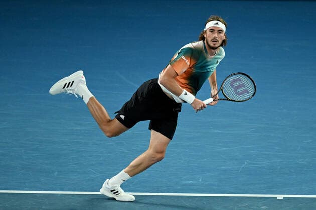 TENNIS AUSTRALIAN OPEN, Stefanos Tsitsipas of Greece serves during his Men?s semifinal match against Daniil Medvedev of Russia on Day 12 of the Australian Open, at Melbourne Park, in Melbourne, Friday, January 28, 2022. ( NO ARCHIVING, EDITORIAL USE ONLY, NO USE IN BOOKS WITHOUT CONSENT MELBOURNE VIC AUSTRALIA  Copyright: xDEANxLEWINSx 20220128001617808294